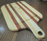 Gorgeous serving board for barbecue made of red rauli wood mixed with pieces of pine wood and sealed with beewax. Free shipping